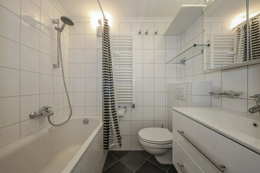 KITZIMMO-Dachgeschosswohnung im Zentrum kaufen - Immobilien Kitzbühel.-11