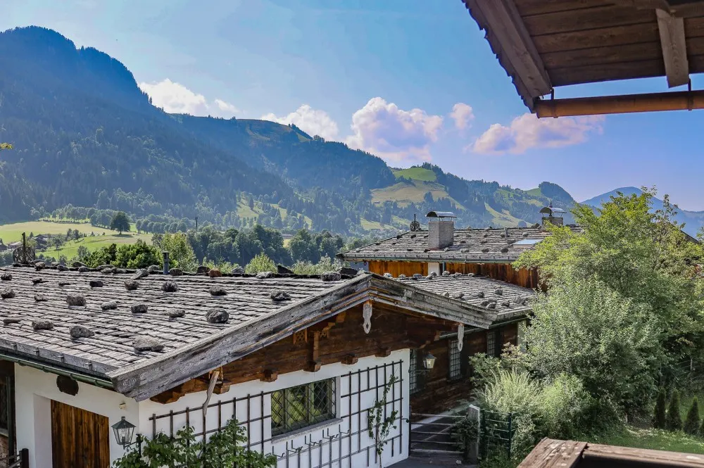 KITZIMMO-Baugrundstück mit Altbestand auf der Bichlalm kaufen - Immobilien Kitzbühel.-1