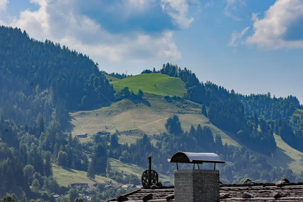 KITZIMMO-Baugrundstück mit Altbestand auf der Bichlalm kaufen - Immobilien Kitzbühel.-1-2