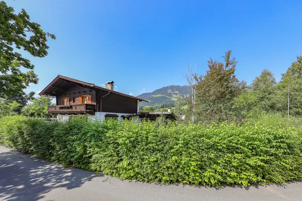 KITZIMMO-Baugrundstück mit Altbestand auf der Bichlalm kaufen - Immobilien Kitzbühel.-1-10