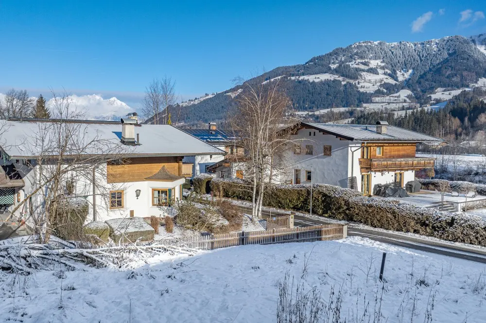 KITZIMMO-Grundstück mit Baugenehmigung für 3-Luxuswohnungen - Immobilien Kitzbühel.