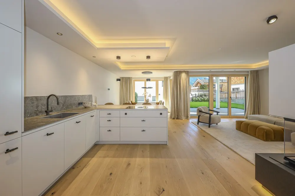 KITZIMMO-Luxuriöse Gartenwohnung mit eigenem Wellnessbereich - Immobilien Brixen.