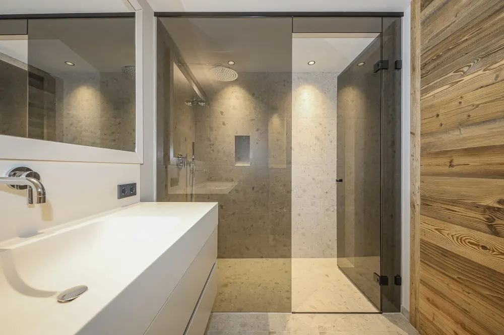 KITZIMMO-Luxuriöse Gartenwohnung mit eigenem Wellnessbereich - Immobilien Brixen.