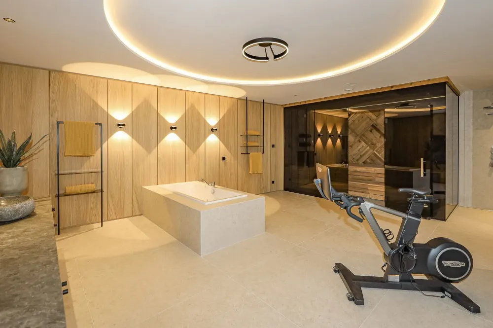 KITZIMMO-Luxuriöse Gartenwohnung mit eigenem Wellnessbereich - Immobilien Brixen.