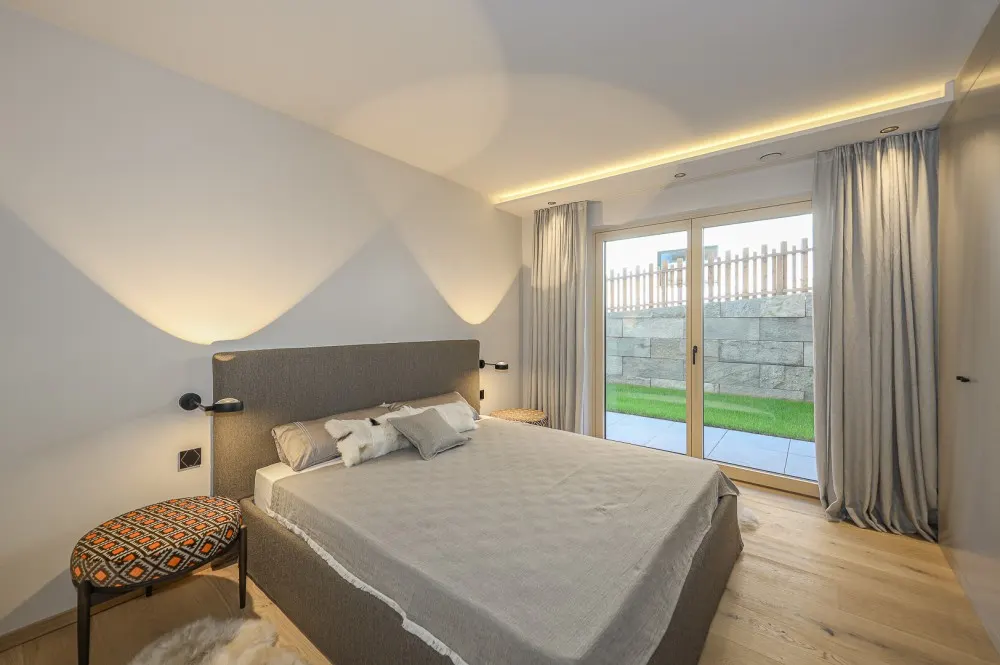 KITZIMMO-Luxuriöse Gartenwohnung mit eigenem Wellnessbereich - Immobilien Brixen.