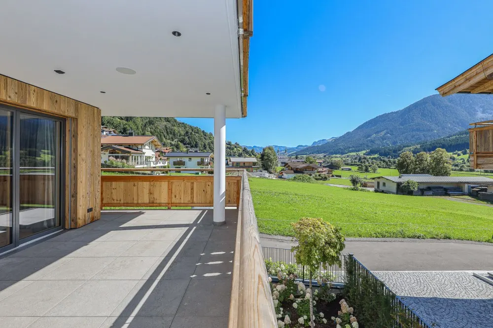 KITZIMMO-Exklusive Neubauwohnung mit traumhaftem Ausblick - Immobilien Brixen.