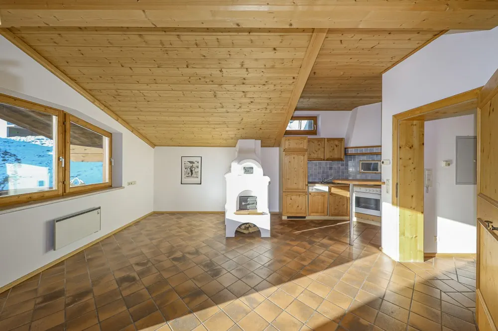 KITZIMMO-Dachgeschosswohnung in sonniger Ruhelage - Immobilien Jochberg.