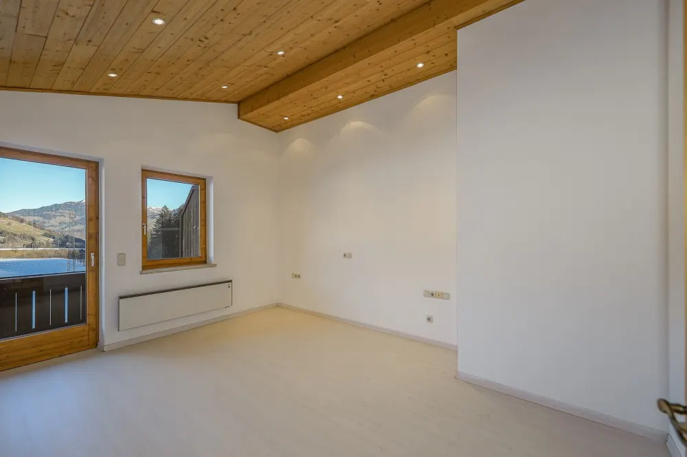 KITZIMMO-Dachgeschosswohnung in sonniger Ruhelage - Immobilien Jochberg.