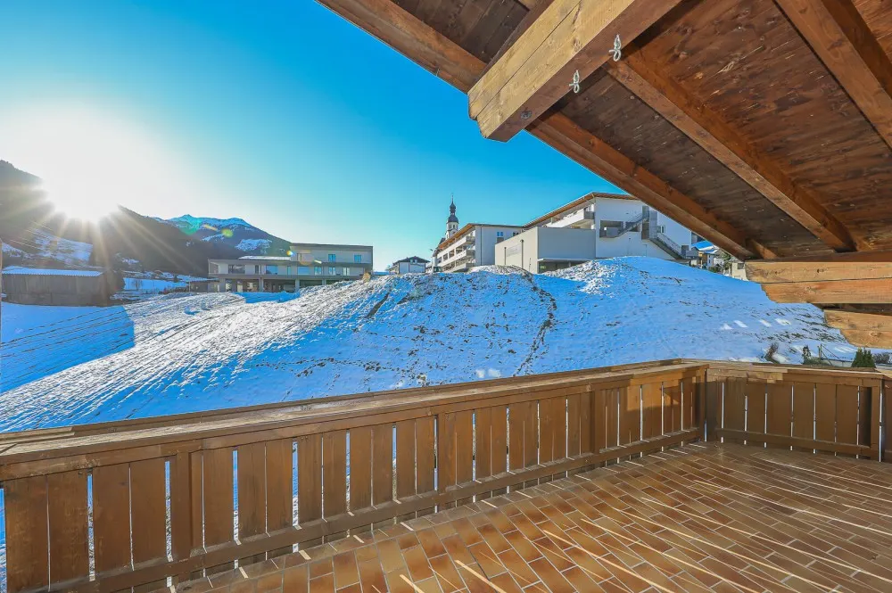 KITZIMMO-Dachgeschosswohnung in sonniger Ruhelage - Immobilien Jochberg.