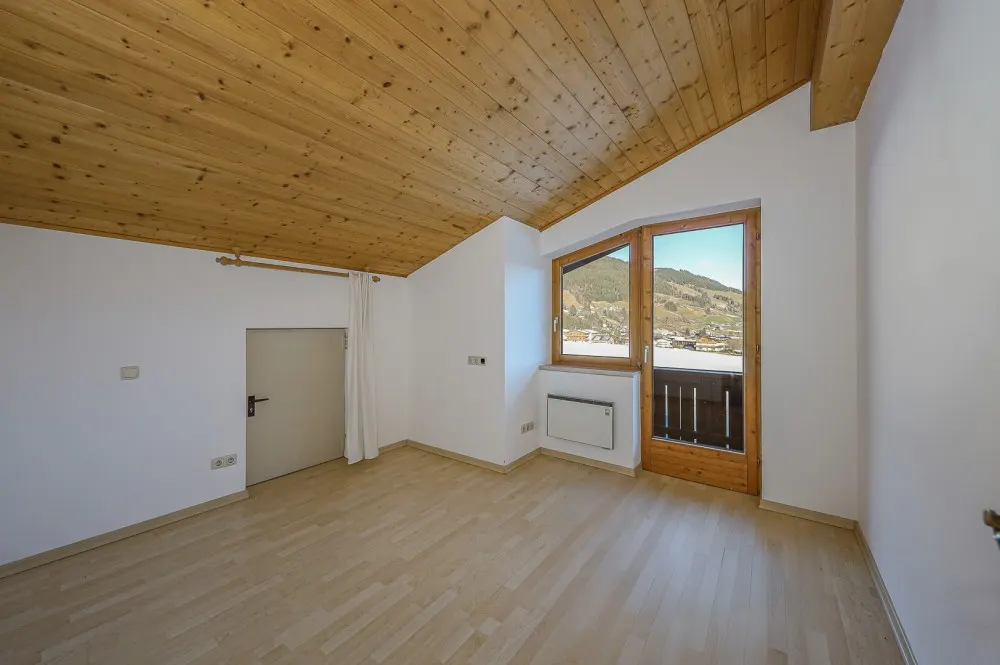 KITZIMMO-Dachgeschosswohnung in sonniger Ruhelage - Immobilien Jochberg.