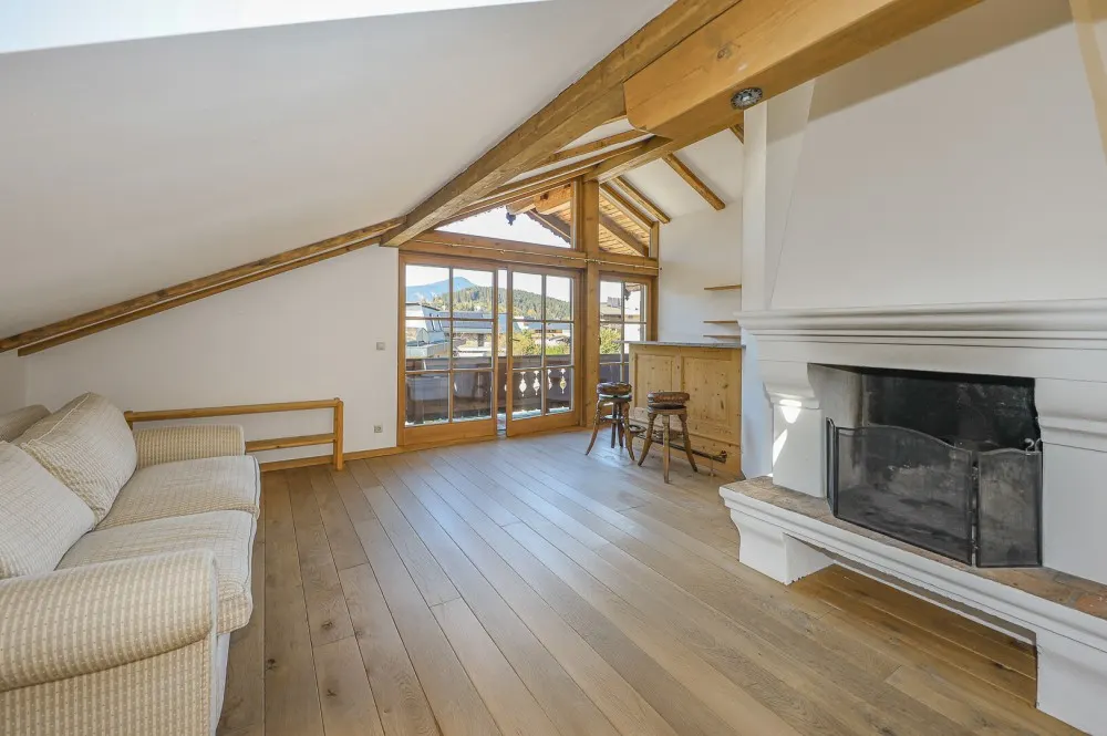 KITZIMMO-Dachgeschosswohnung in Toplage am Sonnberg kaufen - Immobilien Kitzbühel.