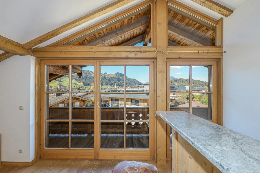 KITZIMMO-Dachgeschosswohnung in Toplage am Sonnberg kaufen - Immobilien Kitzbühel.