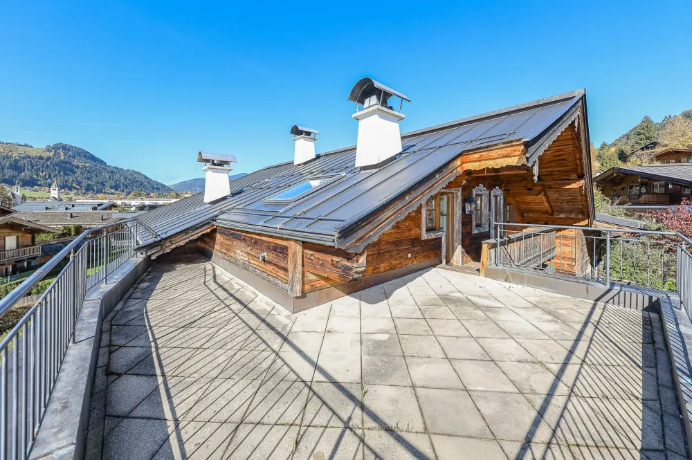 KITZIMMO-Dachgeschosswohnung in Toplage am Sonnberg kaufen - Immobilien Kitzbühel.