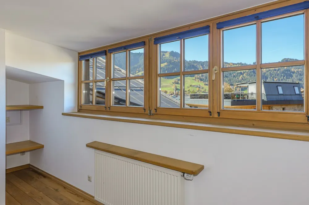 KITZIMMO-Dachgeschosswohnung in Toplage am Sonnberg kaufen - Immobilien Kitzbühel.