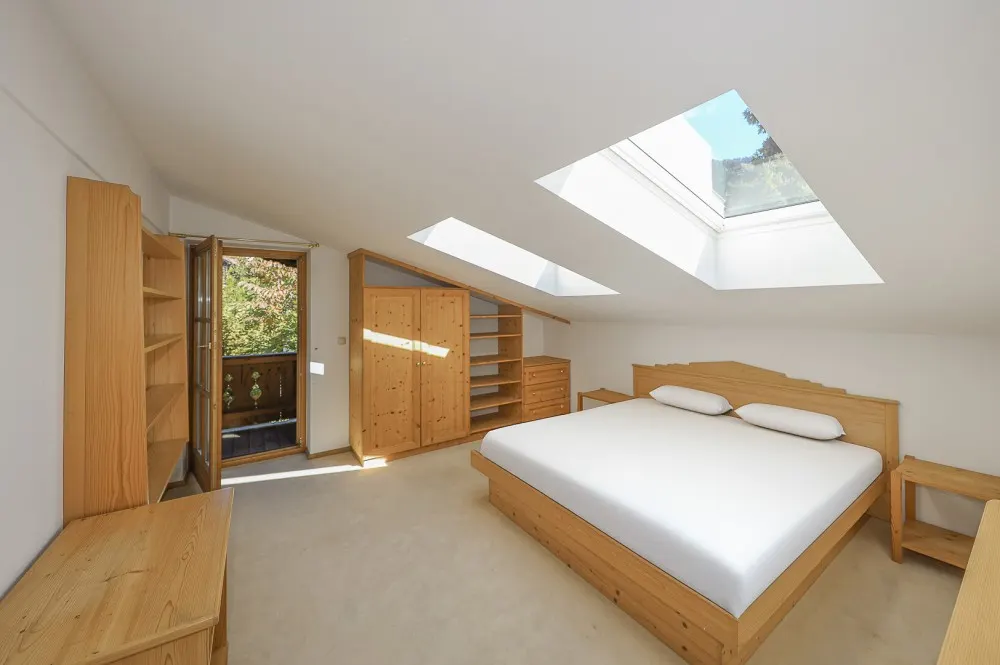 KITZIMMO-Dachgeschosswohnung in Toplage am Sonnberg kaufen - Immobilien Kitzbühel.