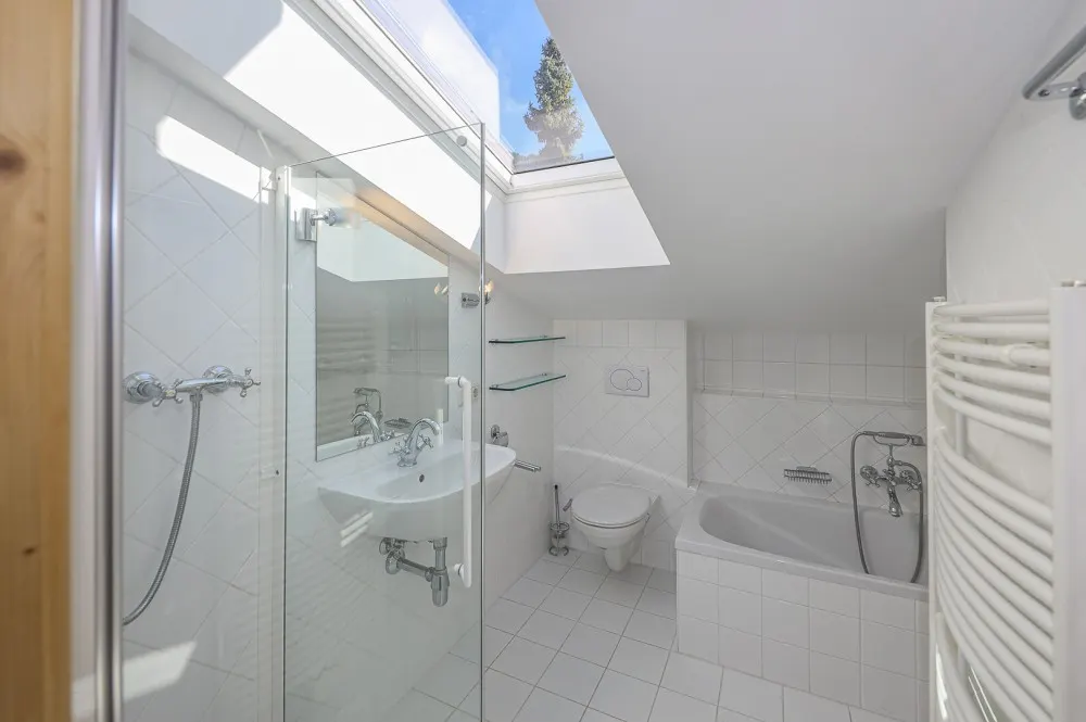 KITZIMMO-Dachgeschosswohnung in Toplage am Sonnberg kaufen - Immobilien Kitzbühel.