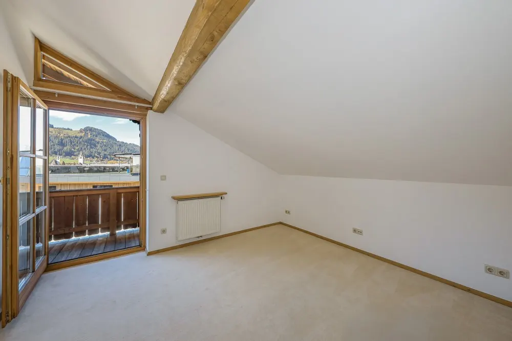 KITZIMMO-Dachgeschosswohnung in Toplage am Sonnberg kaufen - Immobilien Kitzbühel.