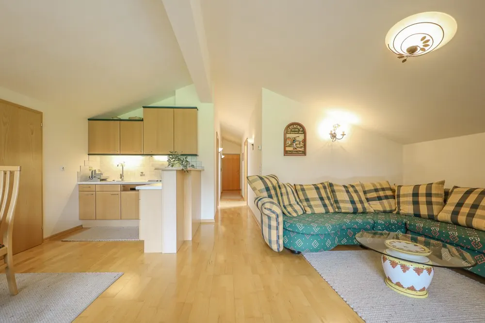 KITZIMMO-Dachgeschosswohnung mit Kaiserblick - Immobilien Aurach.