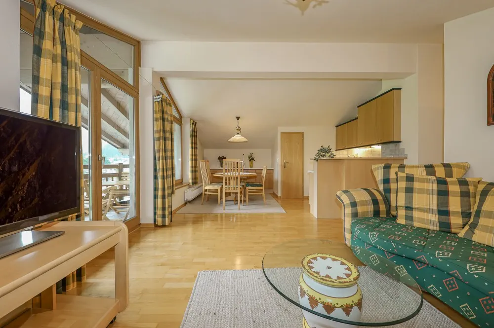 KITZIMMO-Dachgeschosswohnung mit Kaiserblick - Immobilien Aurach.