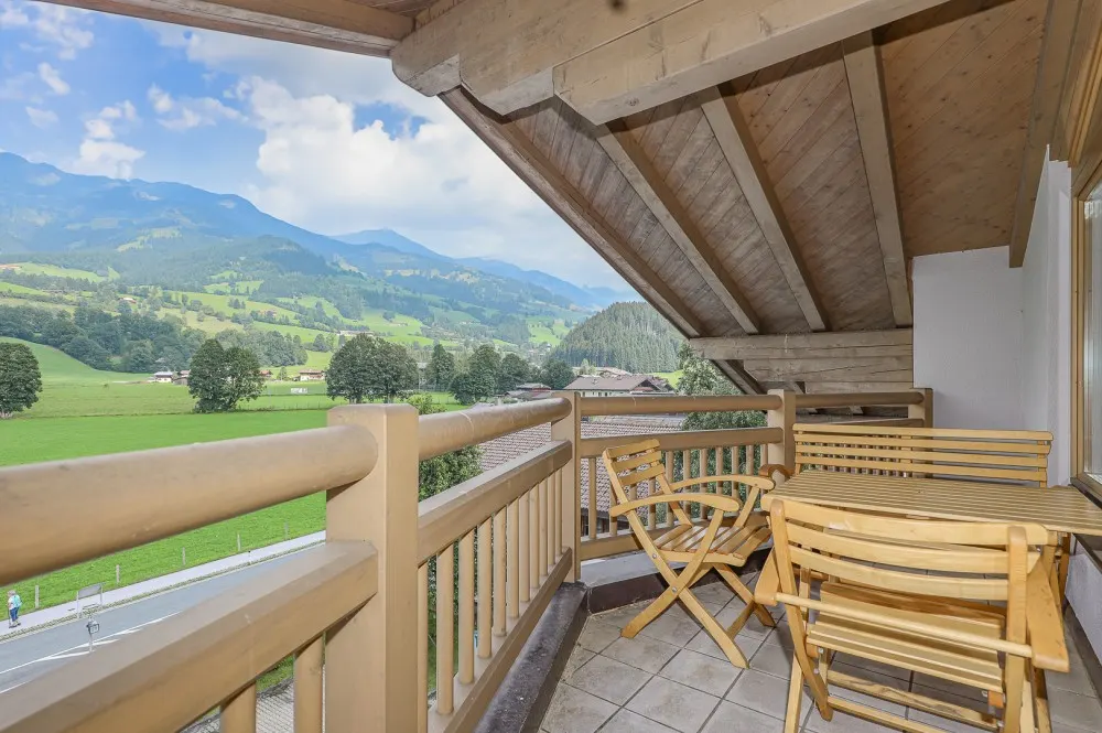 KITZIMMO-Dachgeschosswohnung mit Kaiserblick - Immobilien Aurach.