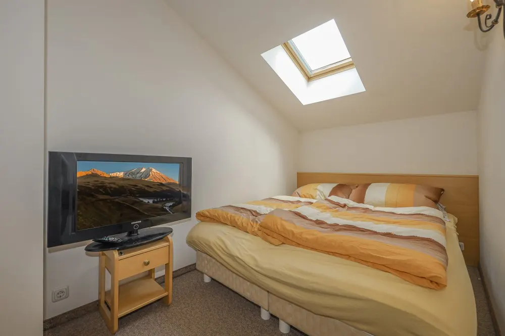 KITZIMMO-Dachgeschosswohnung mit Kaiserblick - Immobilien Aurach.