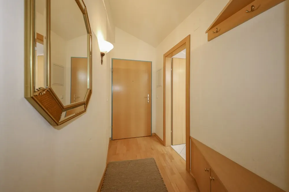 KITZIMMO-Dachgeschosswohnung mit Kaiserblick - Immobilien Aurach.