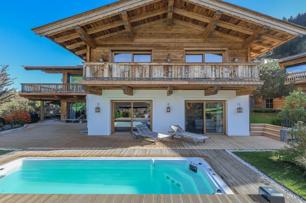 KITZIMMO-Luxuswohnung mit Pool in Toplage kaufen - Immobilie Jochberg.