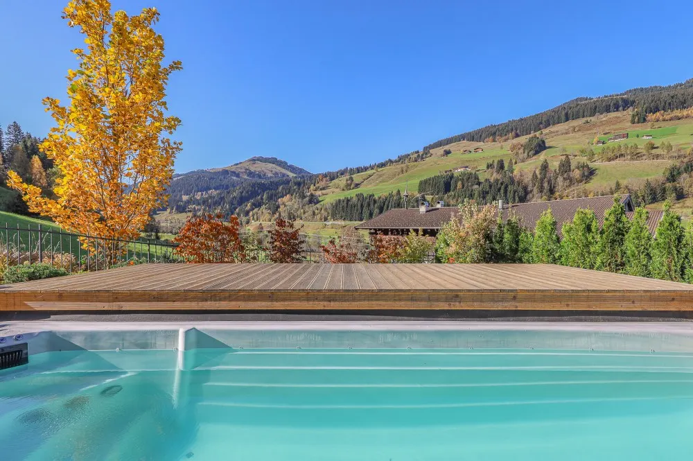 KITZIMMO-Luxuswohnung mit Pool in Toplage kaufen - Immobilie Jochberg.