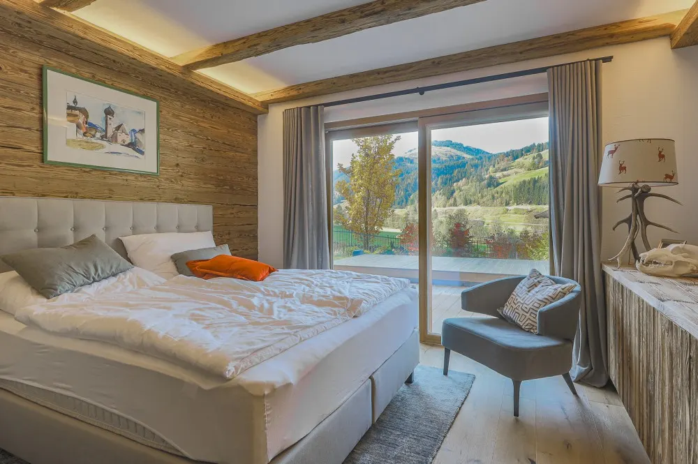 KITZIMMO-Luxuswohnung mit Pool in Toplage kaufen - Immobilie Jochberg.