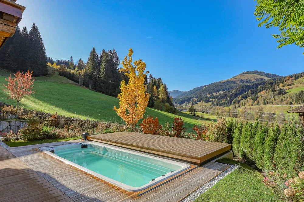 KITZIMMO-Luxuswohnung mit Pool in Toplage kaufen - Immobilie Jochberg.