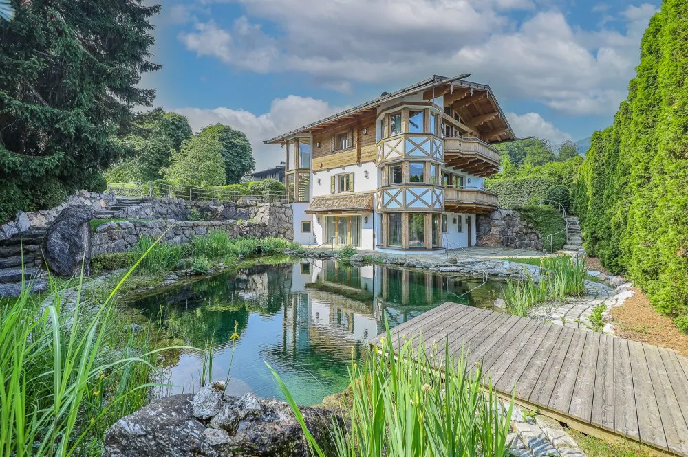 KITZIMMO-Exklusive Luxusvilla mit Freizeitwohnsitz auf der Bichlalm - Immobilien Kitzbühel.