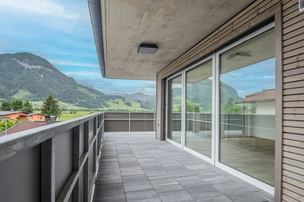 KITZIMMO-Luxuriöses Neubau-Penthouse mit Kaiserblick kaufen - Immobilien Kirchdorf.