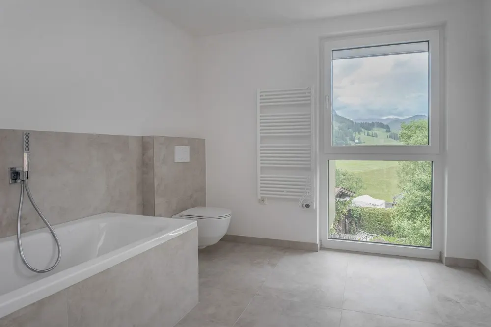 KITZIMMO-Luxuriöses Neubau-Penthouse mit Kaiserblick kaufen - Immobilien Kirchdorf.