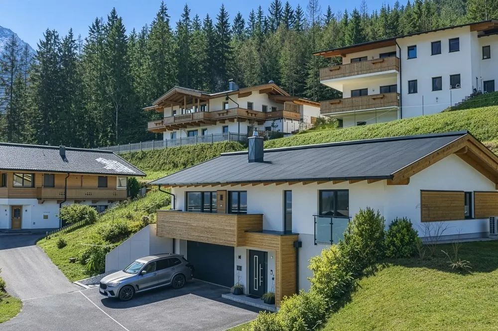 KITZIMMO-Exklusives Einfamilienhaus in Toplage - Immobilien Waidring.