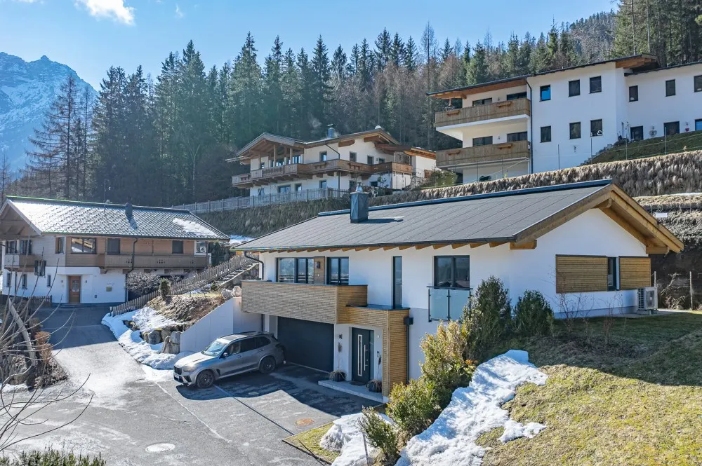 KITZIMMO-Exklusives Einfamilienhaus in Toplage - Immobilien Waidring.