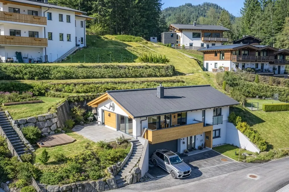 KITZIMMO-Exklusives Einfamilienhaus in Toplage - Immobilien Waidring.