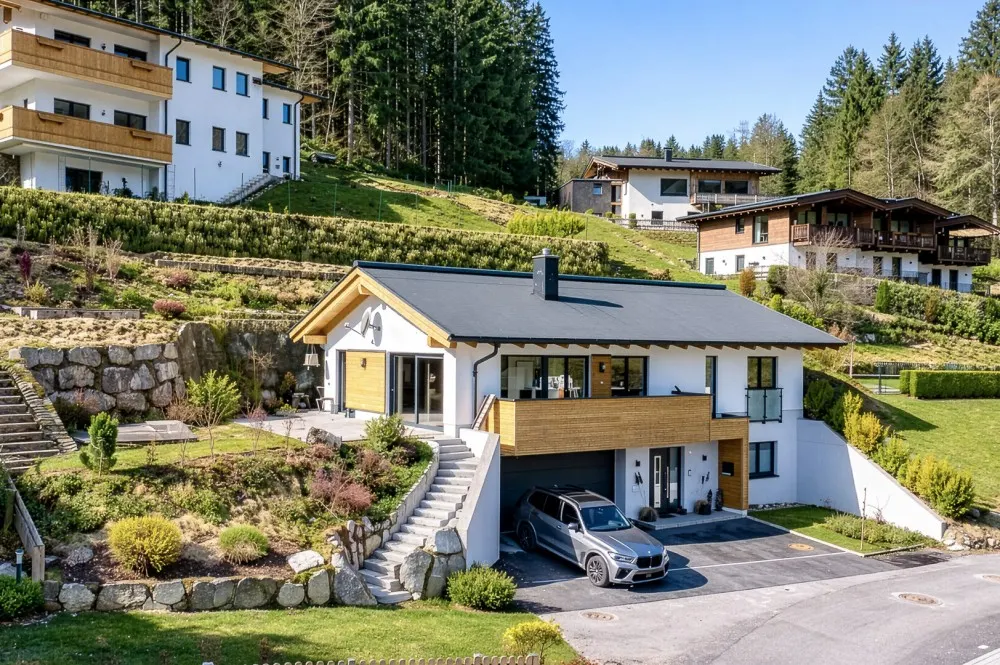KITZIMMO-Exklusives Einfamilienhaus in Toplage - Immobilien Waidring.