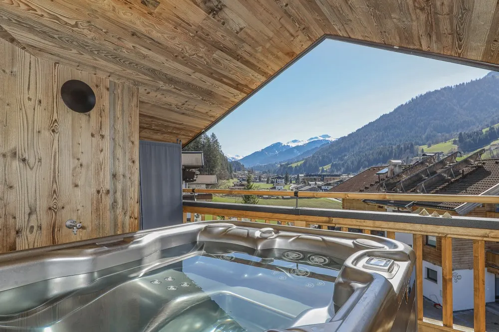 KITZIMMO-Luxus-Penthouse in sonniger Toplage kaufen - Immobilien Kirchberg.