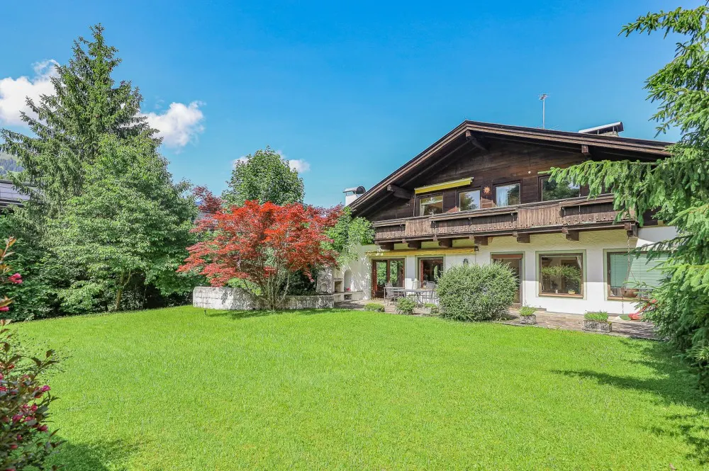 KITZIMMO-Baugrundstück mit Altbestand in Toplage auf der Bichlalm - Immobilien Kitzbühel-1