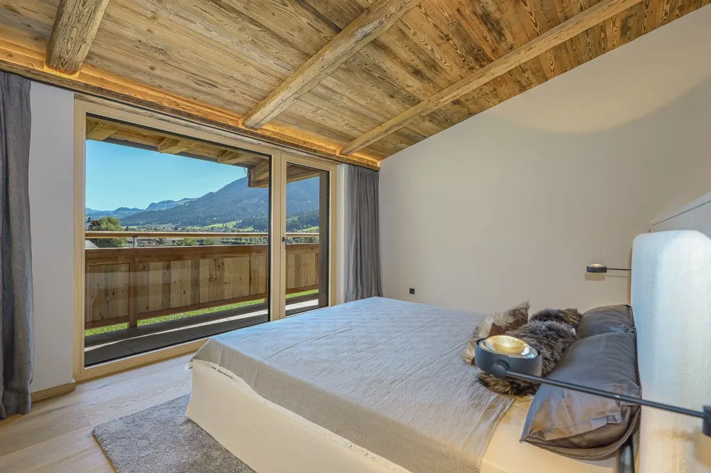 KITZIMMO-Luxuspenthouse sonniger Toplage mit Panorama-Ausblick - Immobilien Brixen.