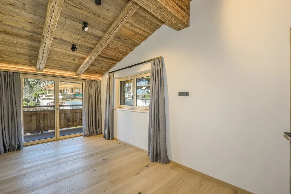 KITZIMMO-Luxuspenthouse sonniger Toplage mit Panorama-Ausblick - Immobilien Brixen.