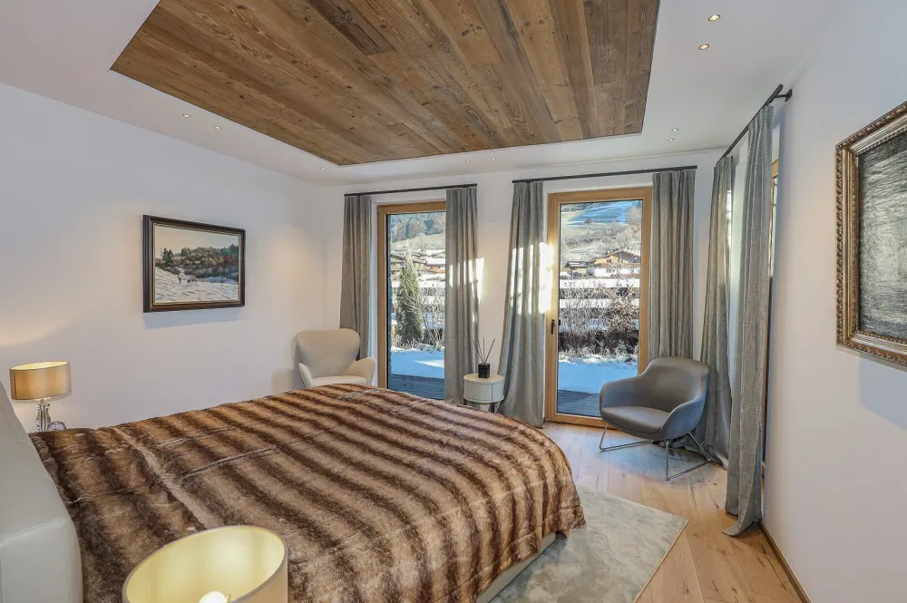 KITZIMMO-Luxuswohnung in Toplage auf der Bichlalm kaufen - Immobilien Kitzbühel.