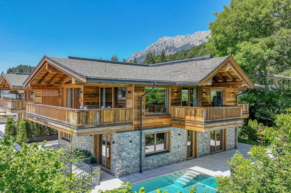 KITZIMMO-Luxus-Neubauvilla mit Pool in Toplage kaufen - Immobilien Ellmau.-1