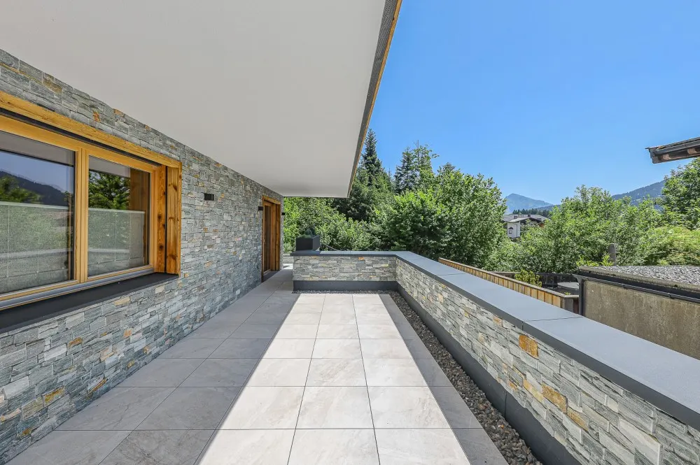 KITZIMMO-Luxus-Neubauvilla mit Pool in Toplage kaufen - Immobilien Ellmau.-31