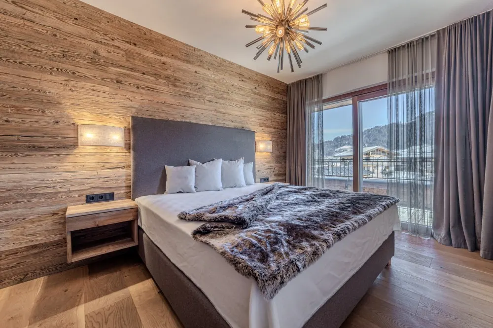 KITZIMMO-Luxuswohnung mit Kaiserblick in Toplage kaufen - Immobilien Oberndorf.