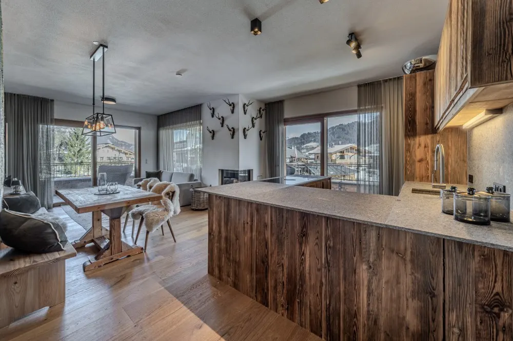 KITZIMMO-Luxuswohnung mit Kaiserblick in Toplage kaufen - Immobilien Oberndorf.