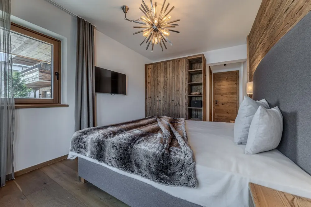 KITZIMMO-Luxuswohnung mit Kaiserblick in Toplage kaufen - Immobilien Oberndorf.