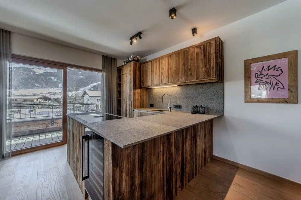 KITZIMMO-Luxuswohnung mit Kaiserblick in Toplage kaufen - Immobilien Oberndorf.