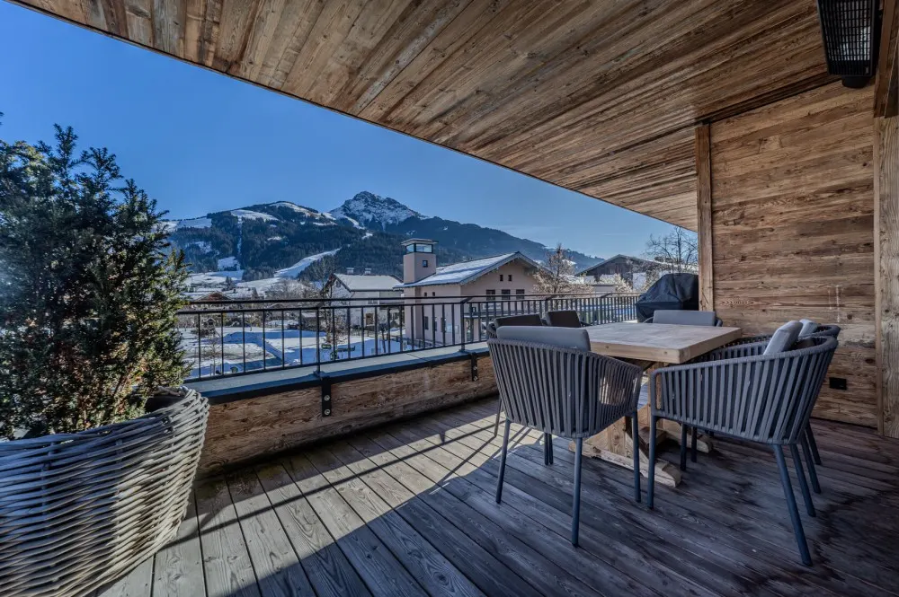KITZIMMO-Luxuswohnung mit Kaiserblick in Toplage kaufen - Immobilien Oberndorf.