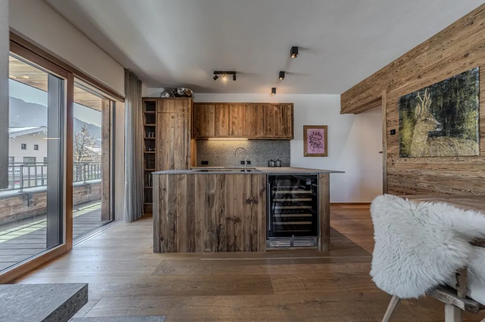 KITZIMMO-Luxuswohnung mit Kaiserblick in Toplage kaufen - Immobilien Oberndorf.